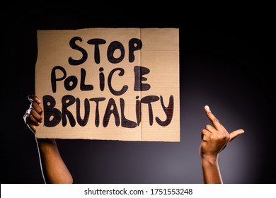Close Up Photo Of Afro American Hand Hold Banner Stop Police Brutality Show Fuck Symbol Ignore Haters Fight Rights Isolated Over Black Color Background