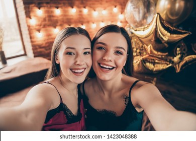 Close Up Photo Amazing Beautiful Two She Her Fancy Cute Chic Ladies Make Take Selfies Toothy Sit Bed Linen Sheets Fellows Buddies Wear Sleep Costumes Girls Day Night Theme Party House Room Indoors