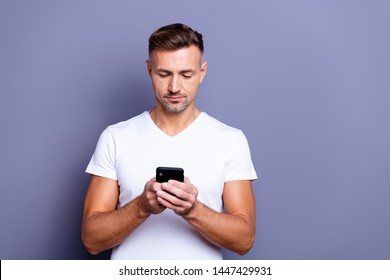 Close Up Photo Amazing He Him His Middle Age Macho Perfect Appearance Easy-going Person Not Smiling Telephone Hands Arms Read Instagram Post Wear Casual White T-shirt Isolated Grey Background