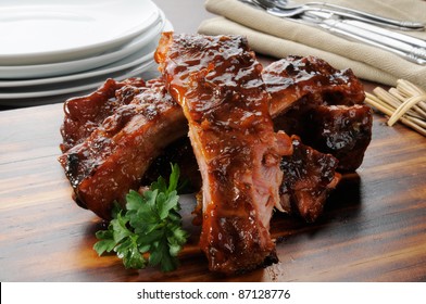 A Close Up Photo Of Barbecued Baby Back Ribs