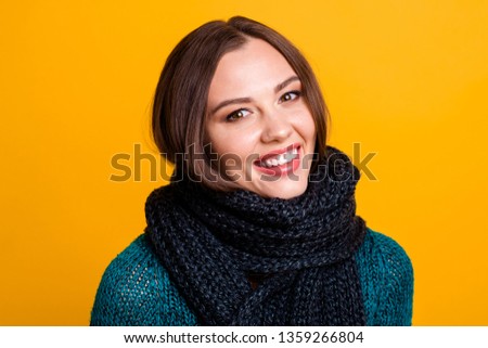 Close up photo beautiful amazing her she lady soft warm scarf around neck overjoyed white teeth sweet kindhearted pretty brown eyes wear green knitted pullover jumper isolated yellow background