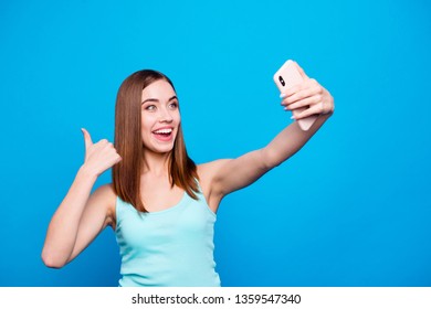 Close Up Photo Beautiful Amazing She Her Lady Toothy Hold Hands Arms Telephone Make Take Selfies Thumb Up Advice New Product Instagram Followers Wear Casual Tank Top Clothes Isolated Blue Background