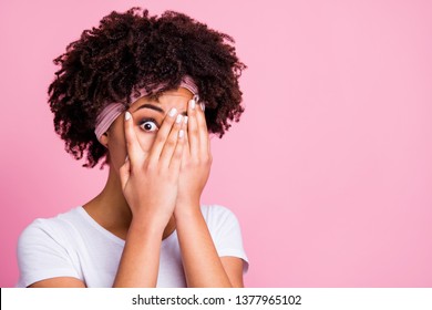 Close up photo beautiful amazing she her dark skin lady arms hands close hide full fear facial expression omg wow shock surprise wear head scarf casual white t-shirt isolated pink bright background
