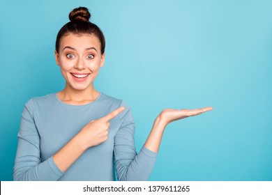 Close up photo beautiful she her lady hold open arm hand palm indicate empty space perfect proposition buy buyer low prices black friday wear casual sweater pullover isolated blue bright background - Shutterstock ID 1379611265
