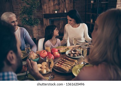 Close up photo big family relatives bonding company brother sister granny mom dad grandpa little daughter say tell speak talk congrats mum appreciation sit festive holiday dishes table house indoors - Shutterstock ID 1361620496