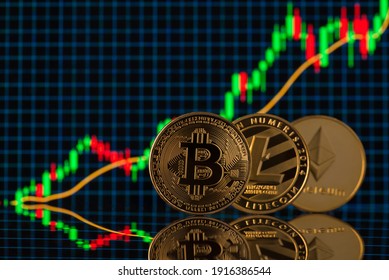 Close up photo of bitcoin litecoin and etherium cryptocurrency standing over the background with digital candle graph going up