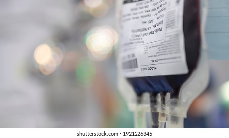 Close up photo of blood back inside operating room.Pack red cell transfusion for trauma patients with bleeding.Selective focus at bag with shallow DOF.Emergency condition need surgery.Medical concept.