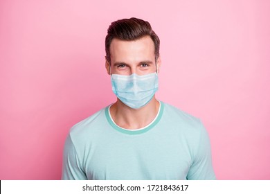 Close up photo of cheerful glad man look keep self-isolation social distance stop spread covid-19 infection wear white fabric mask isolated over pink color background - Powered by Shutterstock