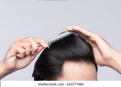 Close Up Photo Of Clean Healthy Man's Hair. Young Man Comb His Hair