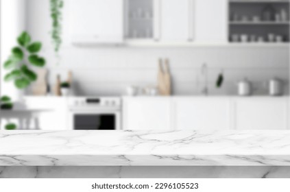 Close up photo of contemporary kitchen island with marble table top with kitchen blurry loose focal background