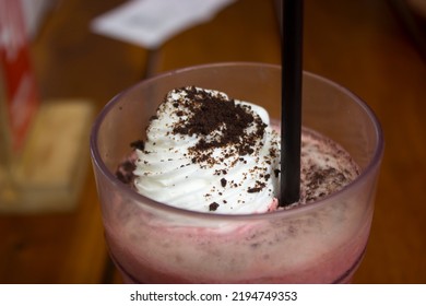 Close Up Photo Of A Drink With A Vanilla Flavored Float On Top With A Sprinkle Of Chocolate