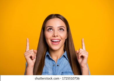 Close up photo of excited energetic girl promoter point index finger suggest select adverts promo wear youth style outfit isolated over bright color background