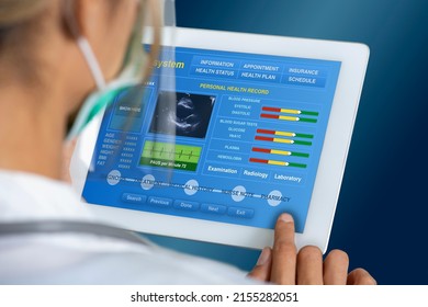 Close Up Photo Of Female Doctor Working On Electronic Medical Record To Check Patient Information.