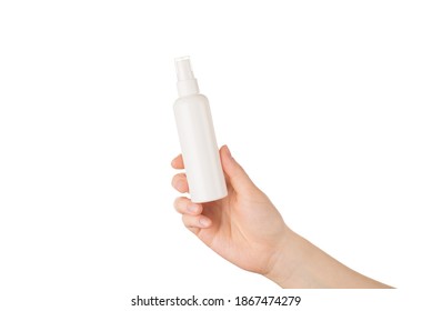 Close up photo of female womna hand holding showing advertising spray bottle isolated white color background with copy space