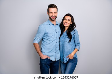 Close up photo funky beautiful amazing cheer she her he him his couple lady guy friends stand close hands arms pockets wear casual jeans denim shirts outfit clothes isolated light grey background - Powered by Shutterstock