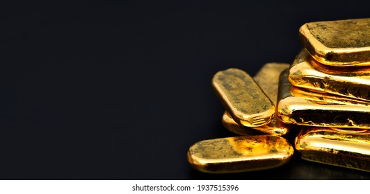 Close Up Photo A Gold Bar On Black Background, Copy Space