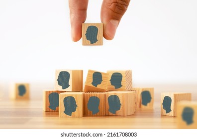 Close Up Photo Of Hand Selecting One Of The Interviewers On Job Application. Concept Of Employee Hire And Recruitment.