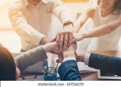 Close Up Photo Of Hands On Top Of Each Other Of Successful Business Partners Who Are Working In Team For One Goal And Happy To Share Victory With Each Other