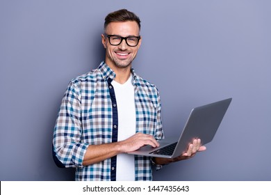 Close up photo handsome attractive he him his cheer guy hands arms hold notebook writing checking letters colleagues partners stylish look wear casual plaid checkered shirt isolated grey background - Powered by Shutterstock