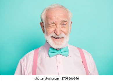 Close up photo of imposing dreamy candid old man wink blink enjoy cool best weekend wear good look clothing isolated over green color background - Shutterstock ID 1709866246