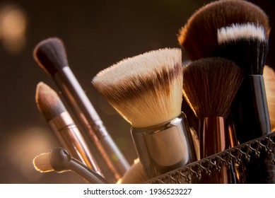 Close up photo of Makeup brushes with Bokeh