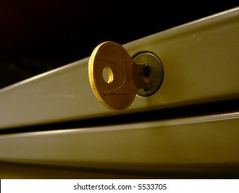 close up photo of modular desk drawer's key in its lock