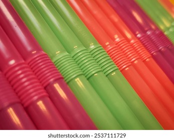 A up close photo of neon flexible straws. - Powered by Shutterstock