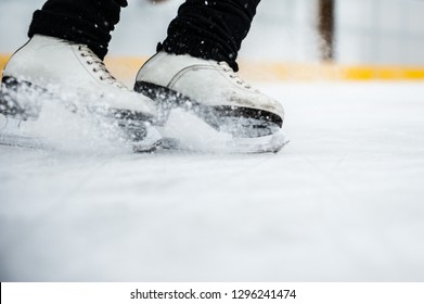 Close Up Photo Of An Old White Figure Skating Shoes In Use