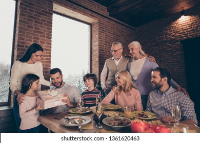 Close Up Photo People Big Family Company Brother Sister Granny Mom Grandpa Son Daughter Give Large Giftbox Box Package Daddy Dad Father Sit Festive Holiday Tasty Dishes Table Loft House Indoors