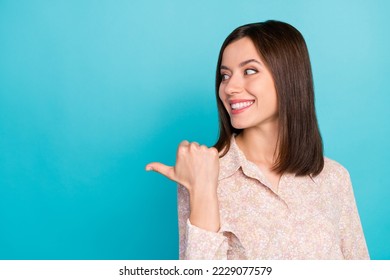 Close up photo of pretty young lady point look advert space dressed stylish smart casual outfit isolated on aquamarine color background - Shutterstock ID 2229077579