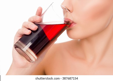 Close Up Photo Of Sensitive  Woman Drinking Cherry Juice