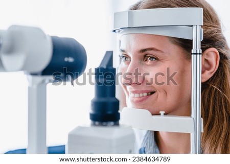 Image, Stock Photo Smiling young woman adjusting her glasses on city street