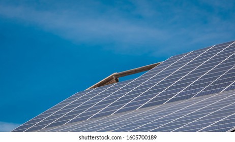 Close Up Photo Of Solar Panels On A Rooftop On A Sunny Day In Alcobendas, A Small City In The North Of Madrid, Central Spain. A Huge Roof With Solar Panels To Generate Clean Energy In Spain.