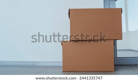 Close up photo of a stack of moving boxes