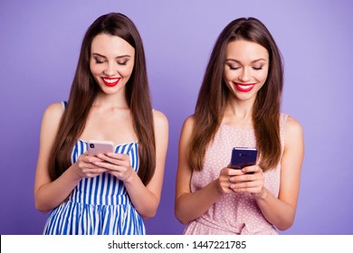 Close Up Photo Two People Beautiful She Her Models Ladies Telephone Smart Phone Using Writing Letters Email Search Check Instagram Followers Wear Colorful Dresses Isolated Purple Violet Background