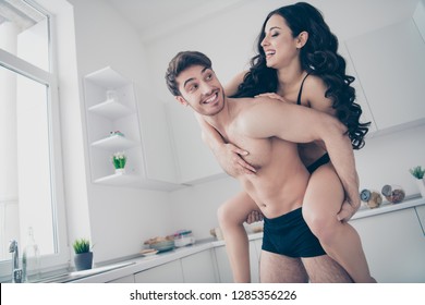 Close up photo of two people pair she her lady he him his piggyback hold carry to bedroom fooling around together play lovely looking adorable funky free time leisure rejoice glad
