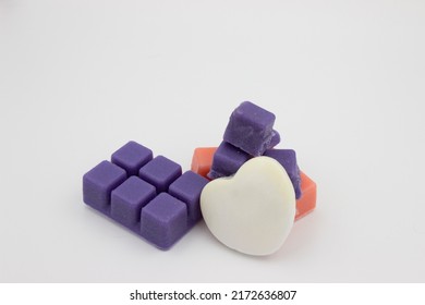 Close Up Photo Of White Heart-shaped Bath Salt And Purple And Pink Sugar Scrub 