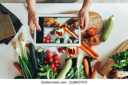 Close Up Photo Of Woman Hands Taking Picture Of Fresh Vegetables On A Digital Tablet At Home: Table Top View Of An Anonymous Woman Making Healthy Lunch With Fresh Colorful Vegetables At Kitchen Desk