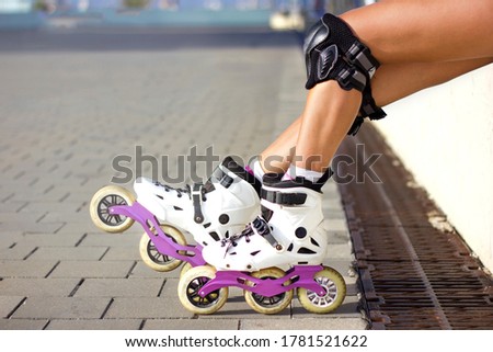 Similar – Woman in roller blades in skate park