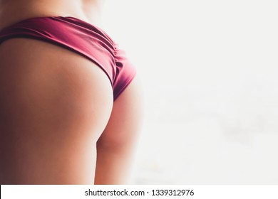 Close Up Photo Of Woman's Buttocks In Lingerie.