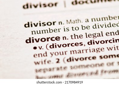 Close up photo of the word divorce in a dictionary book