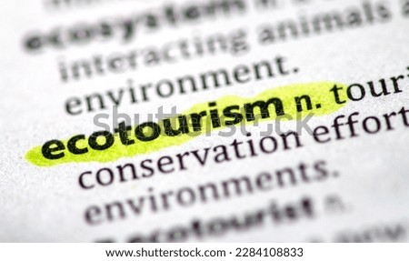 close up photo of the word ecotourism