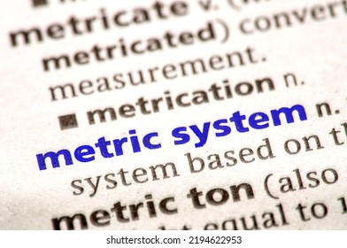 Close Up Photo Of The Words Metric System In A Dictionary Book