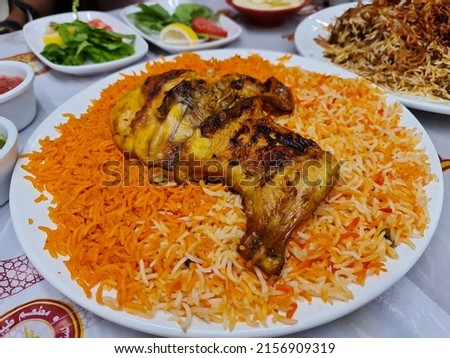 close up photo of Yemeni Madbee rice chicken 