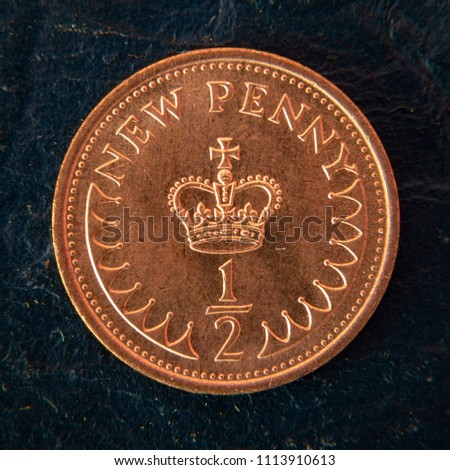 A close up photograph of the reverse of the half new penny created after decimalisation in 1973. It was removed from circulation in 1984. The value had declined through rampant inflation in the 1970s.