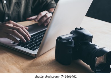 Close Up Of Photographer Editing His Images On Laptop.