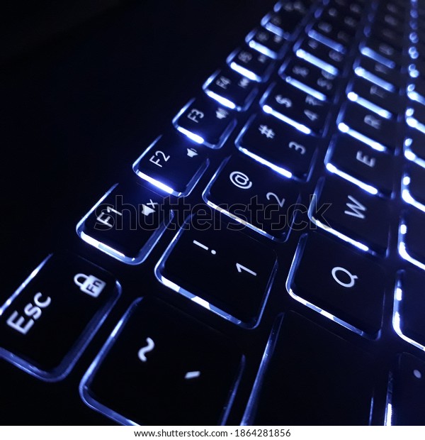 close up pic of backlit\
keyboard 