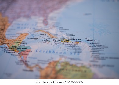 Close Up Picture Focused On Haiti On A Colorful Map Of The Lucayan Archipelago With Its Main Routes Marked In Red And With The Rest Of The Countries And Islands Blurred Out