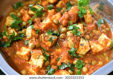 Close up picture of mutter paneer, selective focus on the subject, background blur