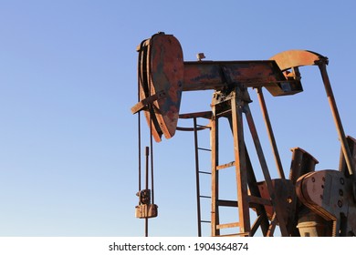 Close Up Picture Of Old Rusty Pump Jack 